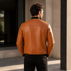 Men’s Tan Leather Bomber Jacket with Black Ribbed Collar & Zipper Pockets